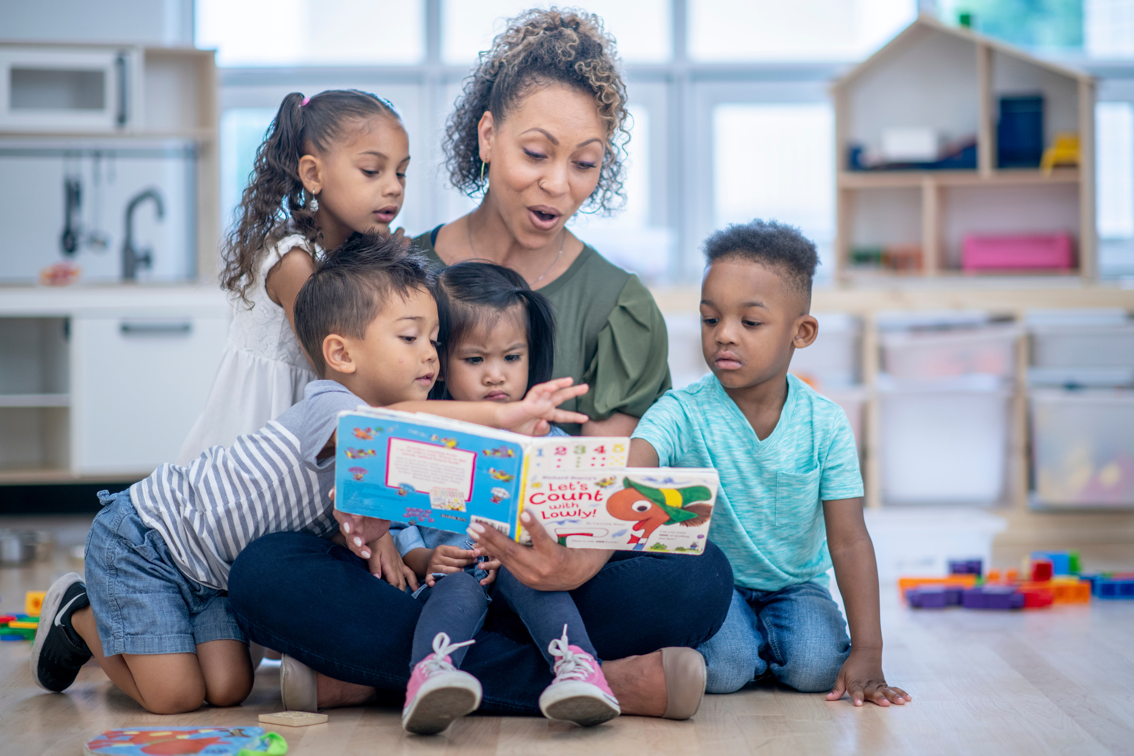 Daycare teacher reading